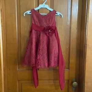 Set of Burgundy formal girls dresses.